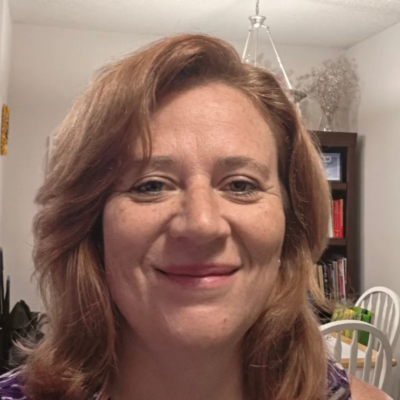 Nadia Rubin, licensed massage therapist and registered nurse, smiling